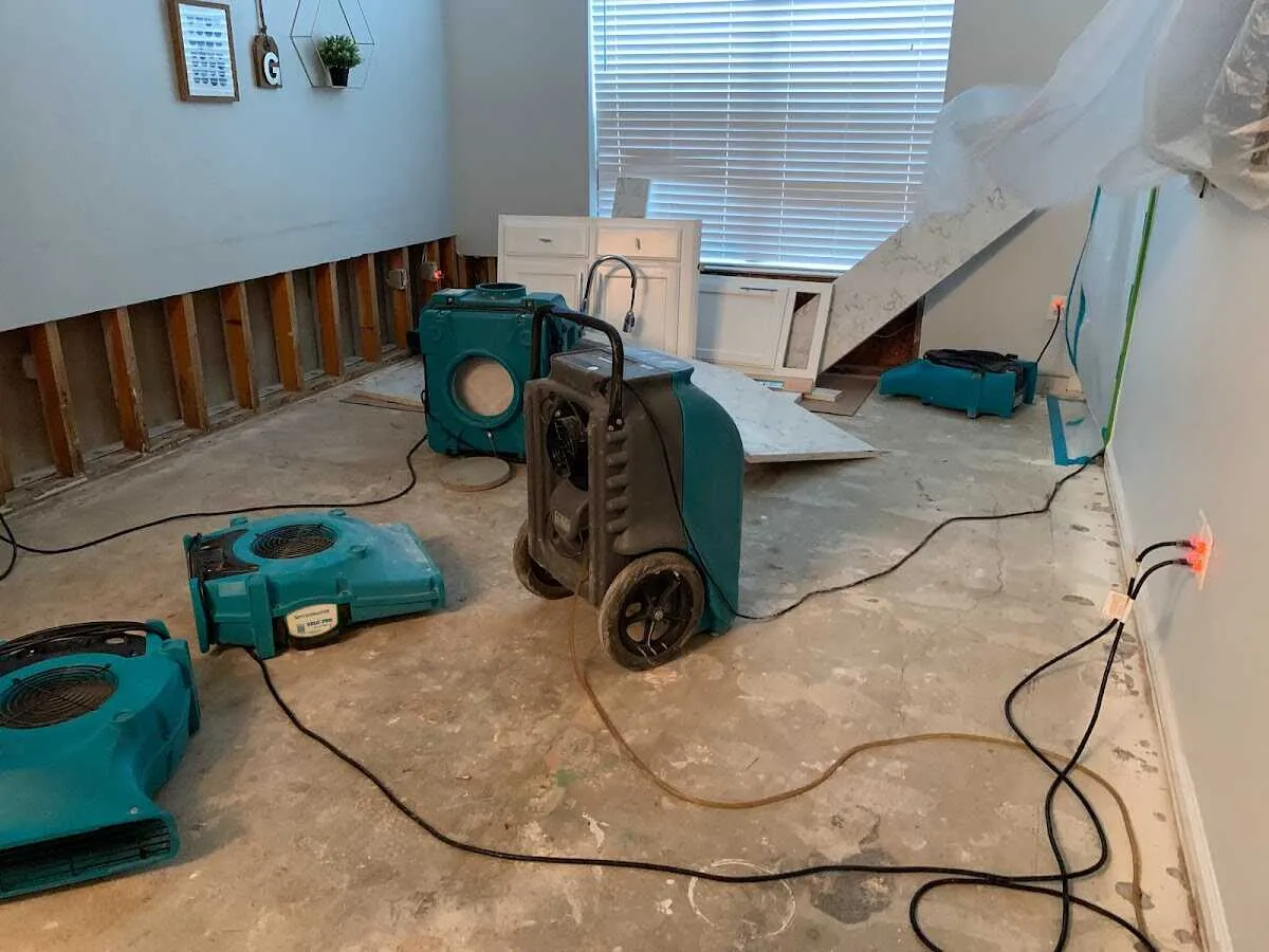 Dehumidifier in flood-cut room for Water Damage Restoration in Manitowoc
